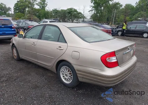 2003 Toyota Camry Le z USA, uszkodzony, nr VIN 4T1BE32K63U127628